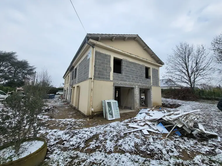 Façade côté jardin avec percements réservés